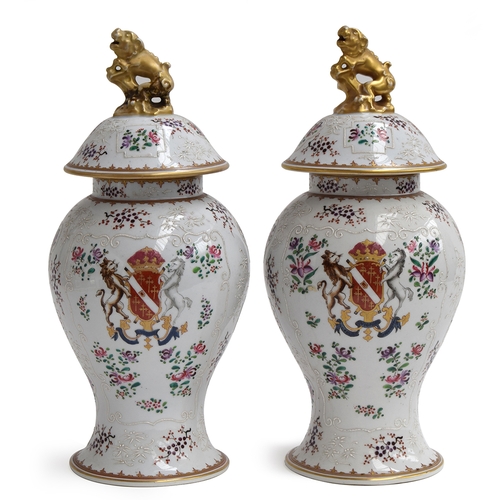 342 - A pair of Samson famille rose and armorial baluster vases and covers, with gilt kylin knops, 40cmH

... 