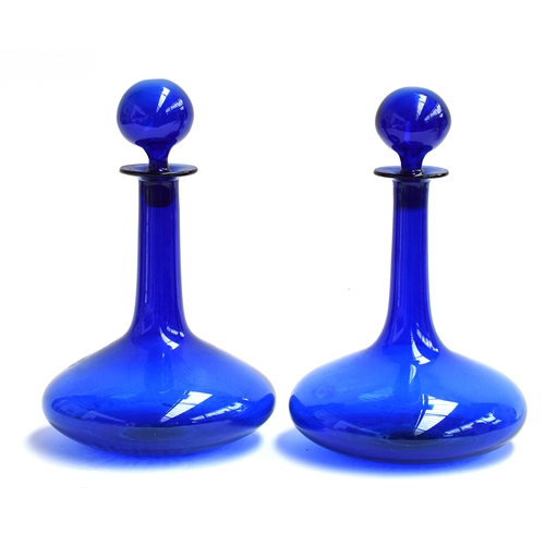 367 - A pair of Bristol blue glass ship's decanters with stoppers, each 28cmH

Provenance: from the estate... 