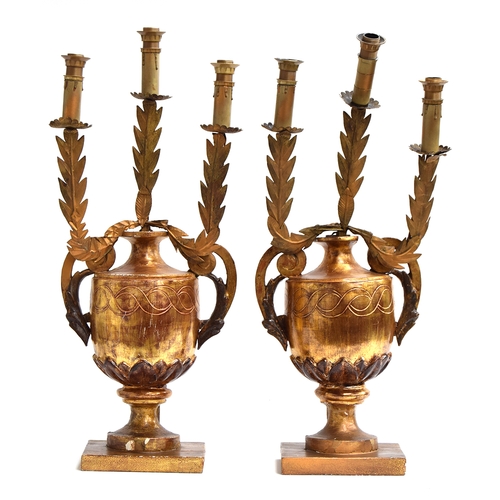 371 - A pair of Venetian giltwood 'urn' three-light candelabra, fitted for electricity, 62cmH

Provenance:... 