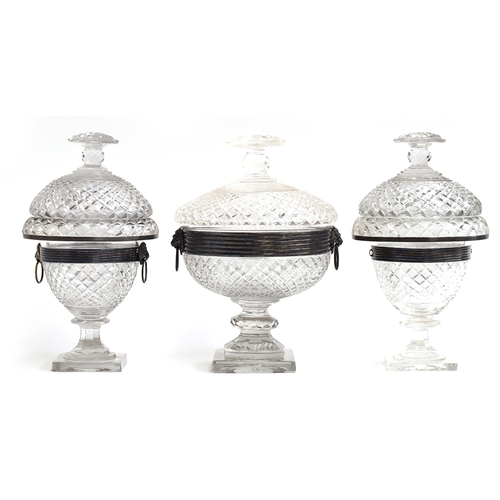 364 - A set of three silvered metal mounted cut glass sweetmeat dishes, each with domed cover, cushion fin... 