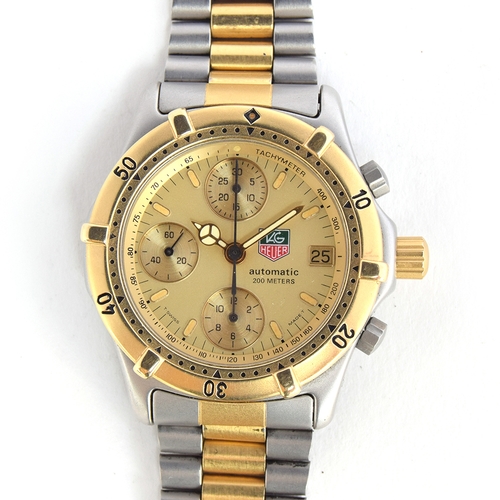 102 - A GENTLEMAN'S STAINLESS STEEL AND GOLD PLATED TAG HEUER CHRONOGRAPH BRACELET WATCH
CIRCA 1990s, REF ... 