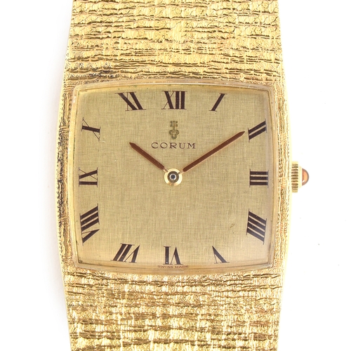 A FINE GENTLEMAN S 18CT SOLID GOLD CORUM SPARTACUS BRACELET WATCH