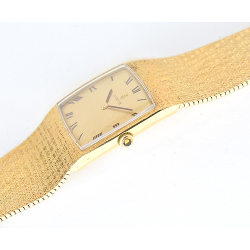 A FINE GENTLEMAN S 18CT SOLID GOLD CORUM SPARTACUS BRACELET WATCH