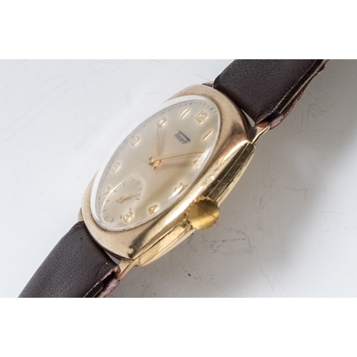 111 - A GENTLEMAN'S 9CT GOLD TISSOT WIRST WATCH
CIRCA 1955, ARABIC NUMERALS, subsidiary dial for constant ... 