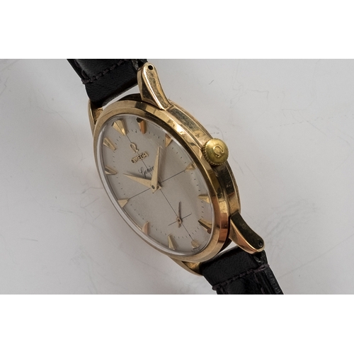55 - A GENTLEMAN'S 9CT GOLD OMEGA GENEVE WRIST WATCH
DATED 1956, SILVER TWO-TONE CROSS HAIR DIAL, DAUPHIN... 