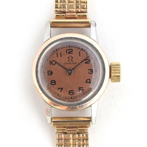 62 - A LADIES STEEL AND ROSE GOLD OMEGA WRIST WATCH
*NOT RUNNING*
CIRCA 1930s, ref 9885382, dial signed O... 