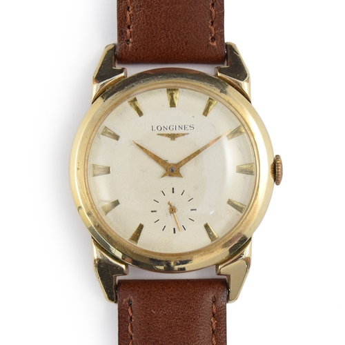 66 - A GENTLEMAN'S 10K GOLD FILLED LONGINES WRIST WATCH
CIRCA 1950s, parchment dial with sub second subsi... 