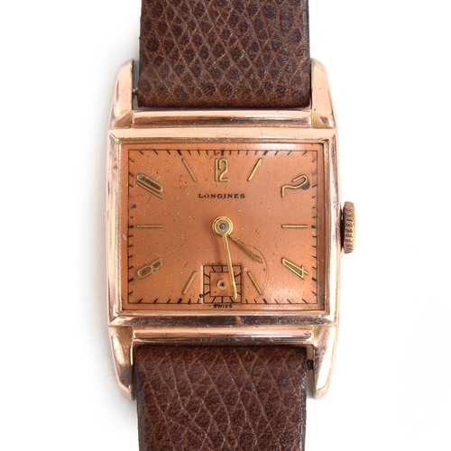 68 - A 10CT GOLD FILLED LONGINES WRIST WATCH
*BROKEN CRYSTAL*
CIRCA 1940s, REF 7324448, COPPER DIAL WITH ... 