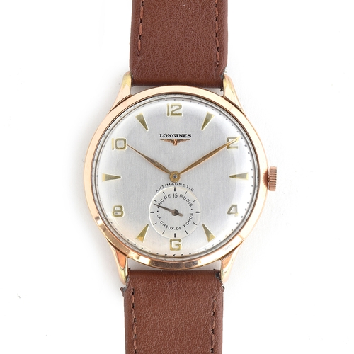 69 - A GENTLEMAN'S STEEL AND GOLD FILLED LONGINES WRIST WATCH
CIRCA 1953, REF B1137801 58197, SILVER DIAL... 