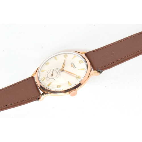 69 - A GENTLEMAN'S STEEL AND GOLD FILLED LONGINES WRIST WATCH
CIRCA 1953, REF B1137801 58197, SILVER DIAL... 