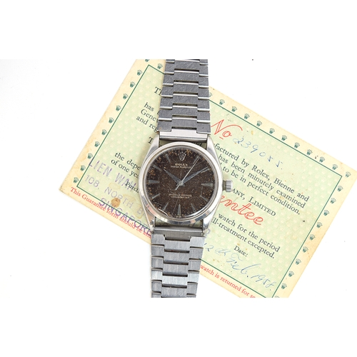 82 - A GENTLEMAN'S STAINLESS STEEL ROLEX OYSTER PERPETUAL WRIST WATCH
CIRCA 1958, REF 6564, BLACK TROPICA... 