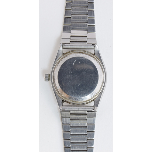 82 - A GENTLEMAN'S STAINLESS STEEL ROLEX OYSTER PERPETUAL WRIST WATCH
CIRCA 1958, REF 6564, BLACK TROPICA... 