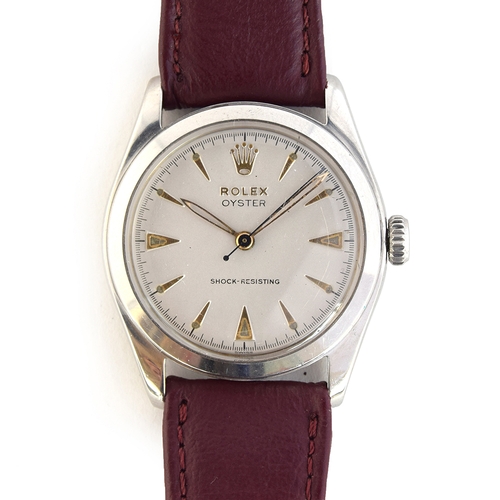 84 - A FINE STAINLESS STEEL ROLEX OYSTER WRIST WATCH
CIRCA 1955, REF 6082, PARCHMENT DIAL, GOLD ARROW HEA... 