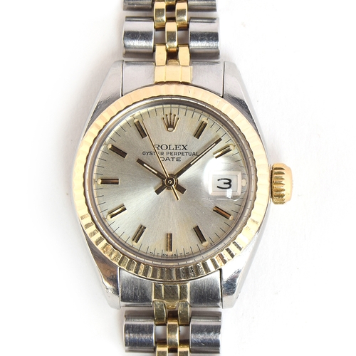 86 - A LADIES STAINLESS STEEL AND 18CT GOLD ROLEX OYSTER PERPETUAL DATE BRACELET WATCH 
CIRCA 1982s, REF ... 