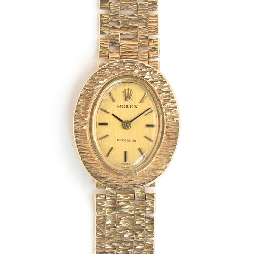 87 - A LADIES 9CT GOLD ROLEX PRECISION BRACELET WATCH
Weight without movement 21g.
DATED 1970, REF 8844, ... 