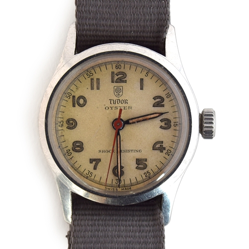 90 - A GENTLEMAN'S STAINLESS STEEL TUDOR OYSTER WRIST WATCH
CIRCA 1945, REF 4453, IVORY DIAL WITH PAINTED... 