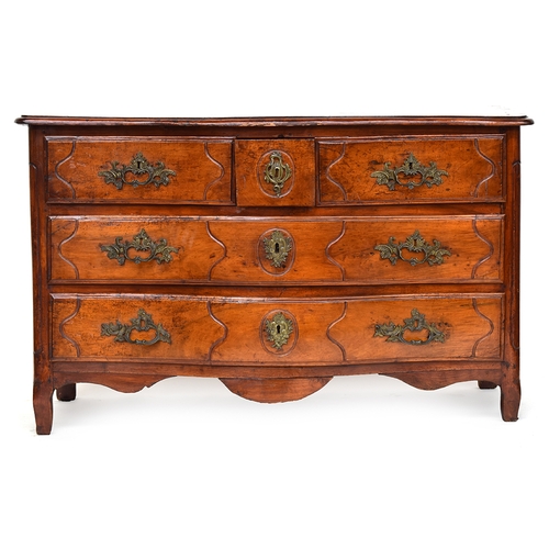 644 - An 18th century French provincial walnut and fruitwood serpentine chest, with two short drawers flan... 