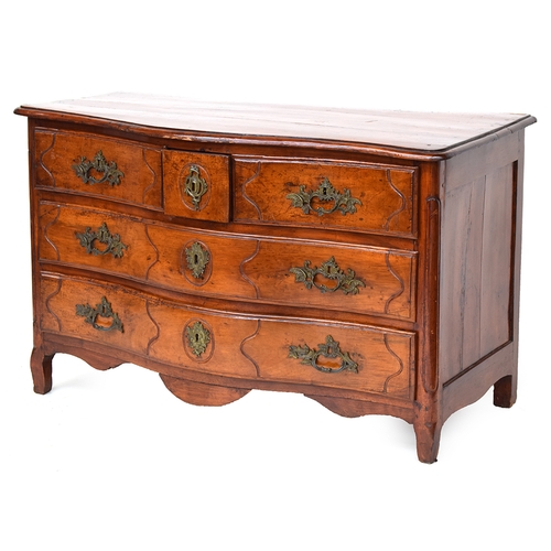 644 - An 18th century French provincial walnut and fruitwood serpentine chest, with two short drawers flan... 