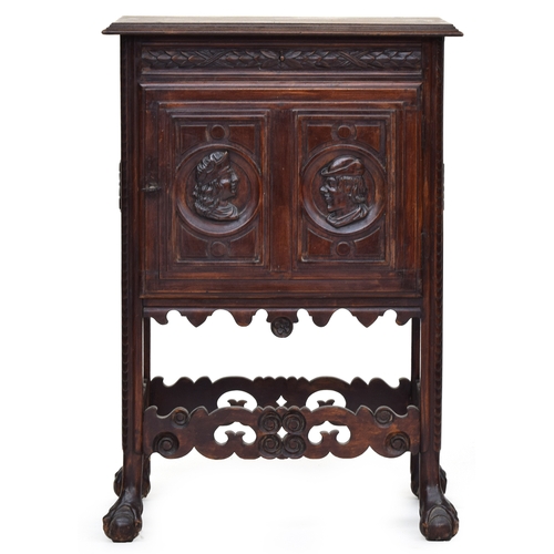 646 - A 19th century Henri II style oak pot cupboard fitted with a single panel door, the legs united by p... 