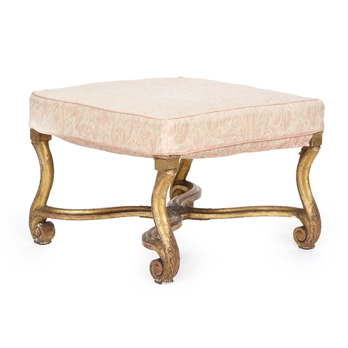 648 - A 19th century upholstered giltwood stool, on acanthus leaf carved scroll supports with carved X str... 