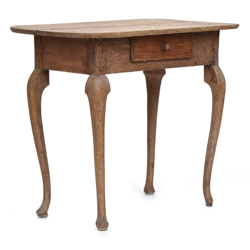 654 - A Continental oak side table, fitted with a drawer, on cabriole supports

Provenance: from the estat... 