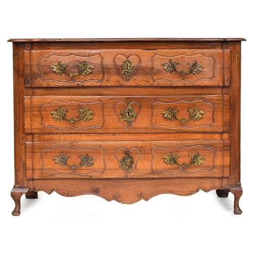 655 - A French 'provincial' walnut serpentine fronted chest, probably 18th century, of three long panelled... 