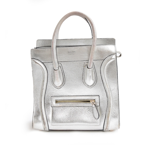 675 - Silver Celine micro luggage handbag in laminated lambskin, interior and exterior zipped pockets, goo... 