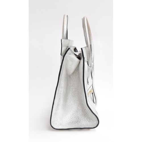 675 - Silver Celine micro luggage handbag in laminated lambskin, interior and exterior zipped pockets, goo... 