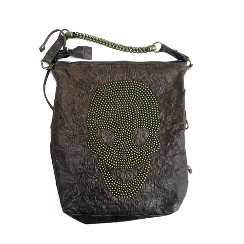 682 - Large brown leather shoulder bag from Thomas Wyld with skull of studs on one side and two zipped poc... 