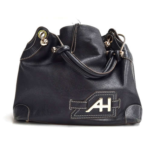 684 - Black leather handbag from Anya Hindmarch,  the leather handle attached by heavy knobbed metal hooks... 