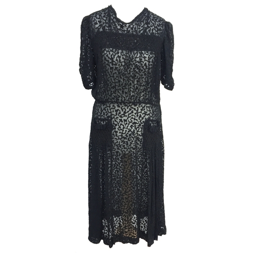 700 - Black silk devore 1930s dress with smocking detail across the chest and on false patch pockets to sk... 