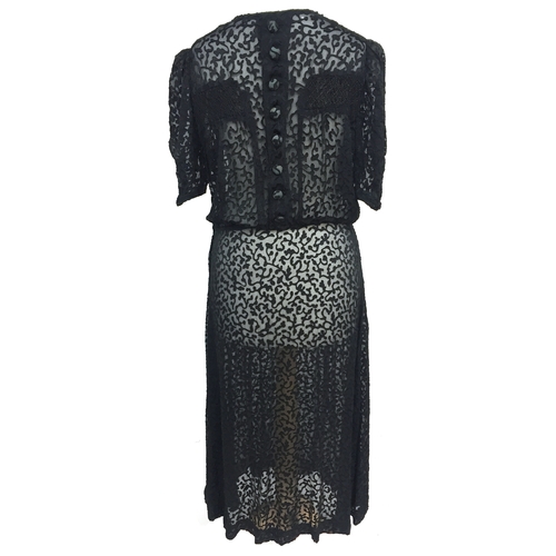 700 - Black silk devore 1930s dress with smocking detail across the chest and on false patch pockets to sk... 