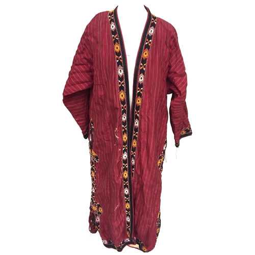 710 - Two silk Tekke Turkman coats, early 20th century, both of hand woven red striped silk, one with brai... 