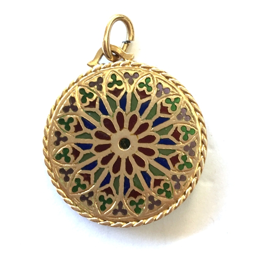 33A - Gold pendant with faded marks (tests as 18ct) in a round filigree form inset with coloured stones/gl... 