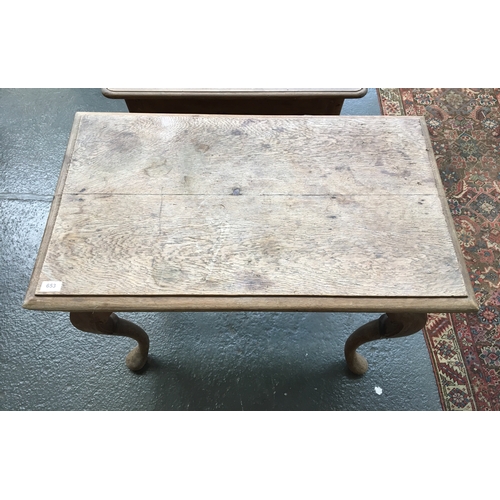 653 - A 19th century continental oak side table with moulded rectangular top on cabriole legs, 90x52.5x75.... 