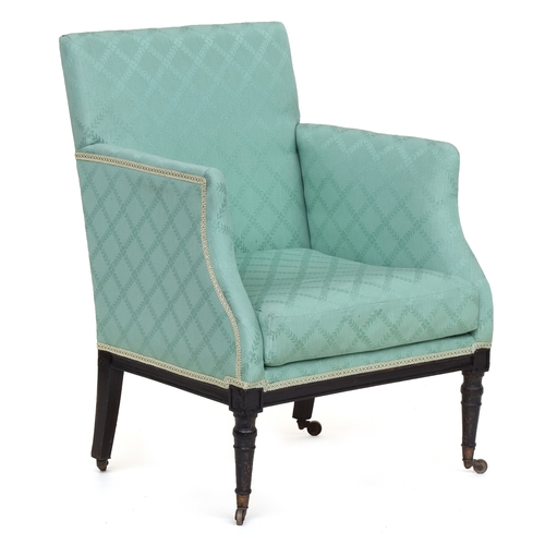 479 - A 19th century bergere armchair, on turned legs with brass cappings and casters, 63cm wide