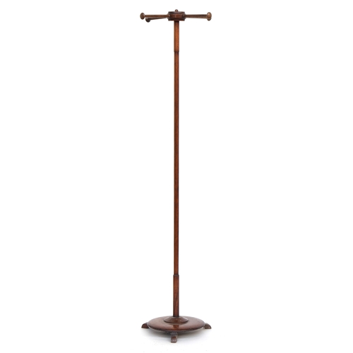 482 - An early Victorian shop stand, four rotating spindles on a plain turned pole, affixed to a spreading... 