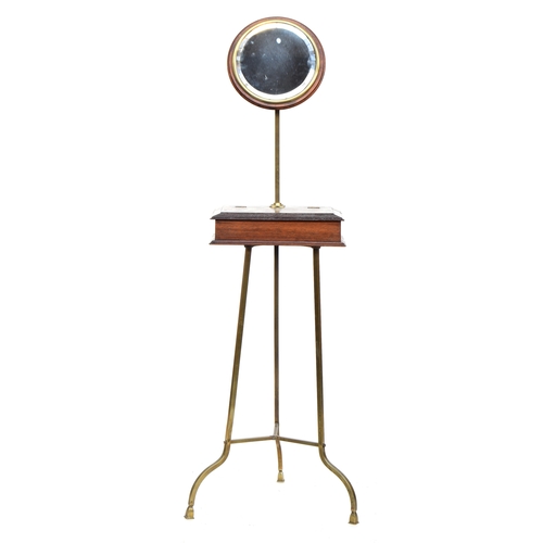 501 - A 19th century mahogany shaving stand with adjustable circular bevelled mirror, on a brass tripod su... 