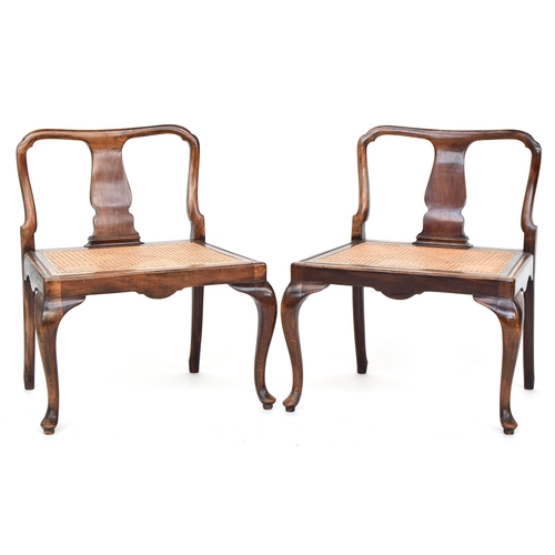 502 - A pair of late 19th century mahogany occasional chairs, with low splat backs and caned seats