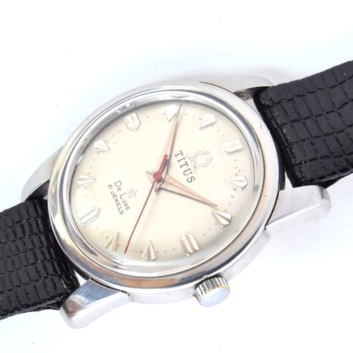 659 - A TITUS DELUXE GENTLEMAN'S STEEL AUTOMATIC WRIST WATCH
Circa 1950s, silvered dial, stylised heart ma... 