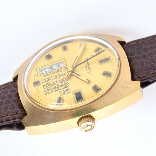 580 - A CARAVELLE GENTLEMAN'S STEEL AND GOLD PLATED AUTOMATIC DAY DATE WRIST WATCH
Circa 1960s, ref. 7540-... 