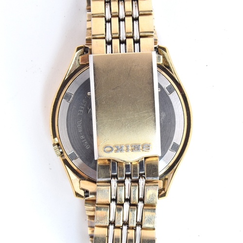 640 - A SEIKO AUTOMATIC DAY DATE GENTLEMAN'S GOLD PLATED STEEL WATCH
Circa 1970s, diameter 36mm, on a Seik... 