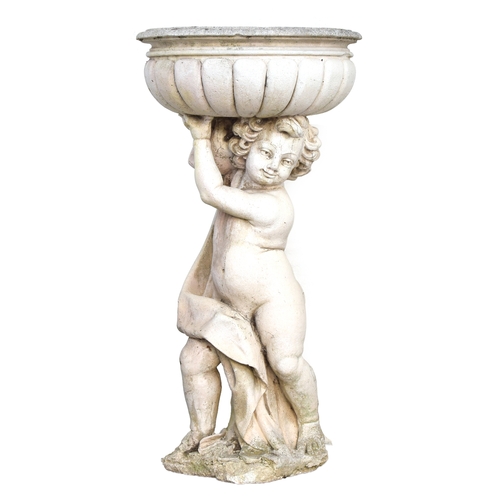 518 - A composite stone urn, supported by a cherub, 118cm high