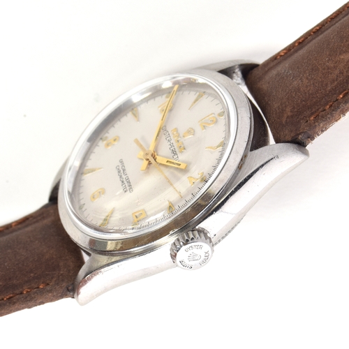 548 - A ROLEX OYSTER PERPETUAL STEEL BUBBLE BACK GENTLEMAN'S WRIST WATCH
Circa 1950s, ref. 6084, cream dia... 