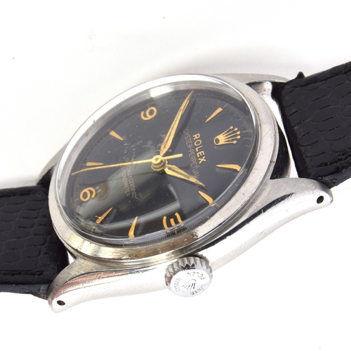 549 - A ROLEX OYSTER PERPETUAL STEEL BUBBLE BACK GENTLEMAN'S WRIST WATCH
Circa 1950s, ref. 6084, black dia... 