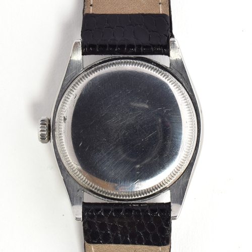 549 - A ROLEX OYSTER PERPETUAL STEEL BUBBLE BACK GENTLEMAN'S WRIST WATCH
Circa 1950s, ref. 6084, black dia... 