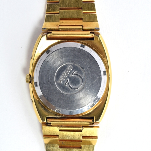 522 - AN OMEGA MEGA QUARTZ 32KHZ GOLD PLATED GENTLEMAN'S WRIST WATCH
Circa 1970s, champagne dial, raised b... 