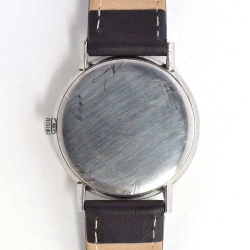 527 - AN OMEGA GENEVE GENTLEMAN'S STEEL WRIST WATCH
Circa 1960s, grey dial, raised silver baton markers, s... 