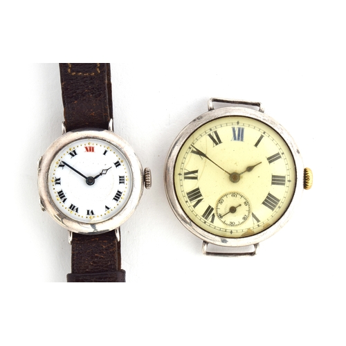 704 - A PIAR OF SILVER TRENCH WATCHES
Circa, 1910

Porcelain dial red 12 diameter 25
White dial Roman nume... 