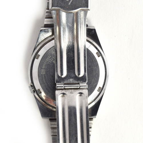 649 - A SEIKO 5 STEEL AUTOMATIC WRIST WATCH
circa 1980s, black dial raised gold baton markers, straight lu... 